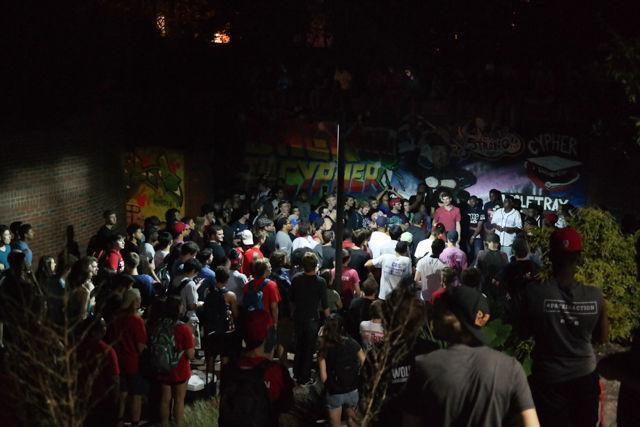 Students gather for the first Cypher of the year at the Free Expression Tunnel on Monday, Aug. 22. Students come to Cypher to listen to other students freestyle on a variety of topics including politics, social justice, music artists and others. Cypher has been on NC State's campus for six years, and the group was recently approved as a student organization.