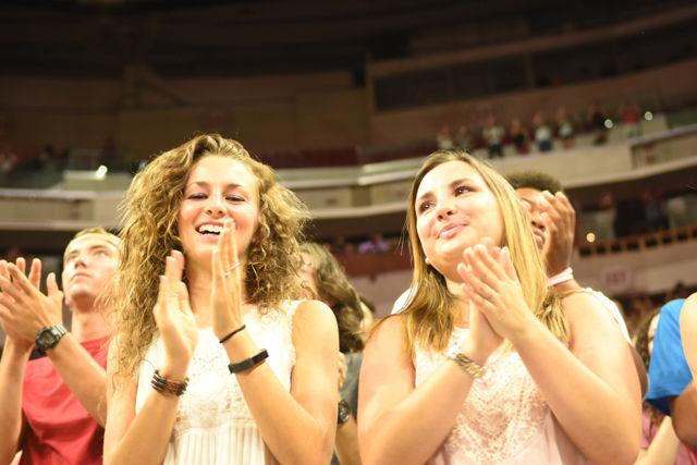 Cassie Alphin, a freshman studying creative writing, and Ashley Mayhew, a freshman majoring in exploratory studies, participate in the activites of Convocation. The celebration was held on August 15, 2016 at PNC Arena.