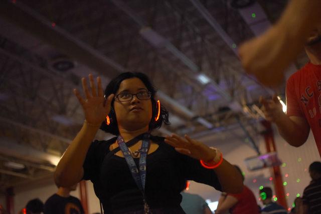 Kimi Ramos, a junior studying psychology, dances to an EDM track at Silent Disco in Carmichael Gym. Kimi said she attended the event since she, "[doesn't] get many chances to go to dances like this." Aug. 19 was the 7th annual Silent Disco at North Carolina State University.