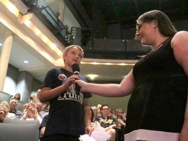 Matthew Schricker, 11, asks Pence if his roll in the administration is going to be to "soften up" Trump's statements. Republican Vice Presidential nominee Mike Pence addressed questions during his town hall, held Thursday morning at the Duke Energy Center for Performing Arts.