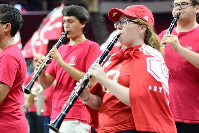 The NC State band filled the floor as they played fight songs at PNC Arena on Aug. 15, 2016. First year students were on their feet at Convocation as they learned the lyrics from band director, Paul D. Garcia.