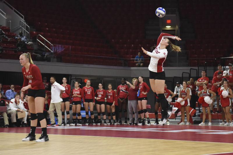 Senior defensive specialist, Rachel Eppley, jumps to serve in against UNC Chapel Hill at Reynolds Coliseum Sept. 22, 2016. Eppley achieved 5 spikes and 1 kill in the Wolfpack's in a 3-2 loss against UNC Chapel Hill.