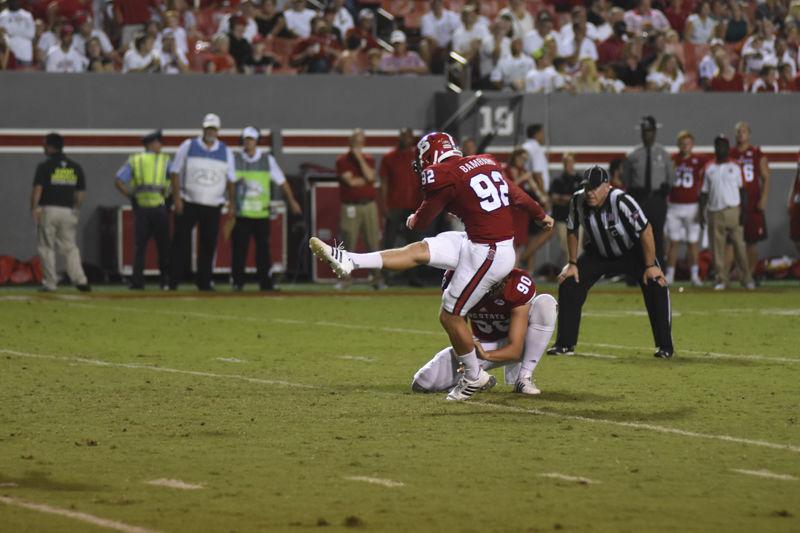 Sophomore placekicker, Kyle Bambard, kicks the ball on the field at the Old Dominon game held at Carter-Finley Stadium on Sept. 17. Bambard kicked off 6 times with a total of 355 yards for the whole game against Old Dominion.
