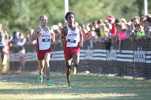Bakri Abushouk and Sebastian Hanson lead the Wolfpack at the finish of the Adidas XC Challenge on Sept. 18, 2015 at the Wake Med Soccer Park.