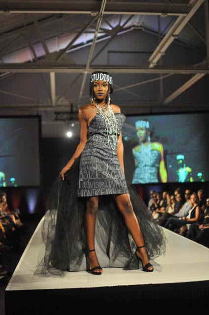 A model wears a piece from Studio B's "Art Meets Fashion" line at fashionSPARK, a part of SPARKcon, on Sept. 16 at CAM Raleigh. The theme for the designers at fashionSPARK was Wear What You Are. The collection consisted of pieces that had graffiti hand painted on denim to create a high fashion look.