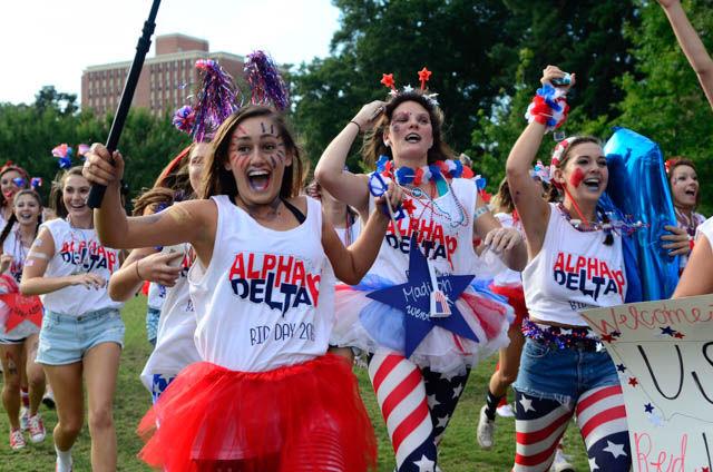 Members of the Alpha Delta Pi rushes across Stafford Commons on Bid Day to greet their new initiate class on September 14.