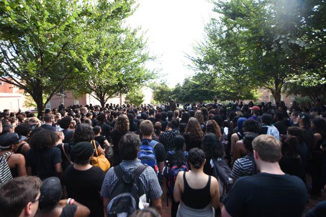 Students gather in Wolf Plaza for the NC State Blackout on Sept. 23. Students were told to dress in all black in protest of recent events of police brutality happening in Charlotte.
