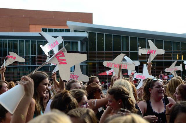 The members of the Kappa Delta Sorority use paper plane cutouts to pair their new initiates with their big sisters during Bid Day at Stafford Commmons on September 14