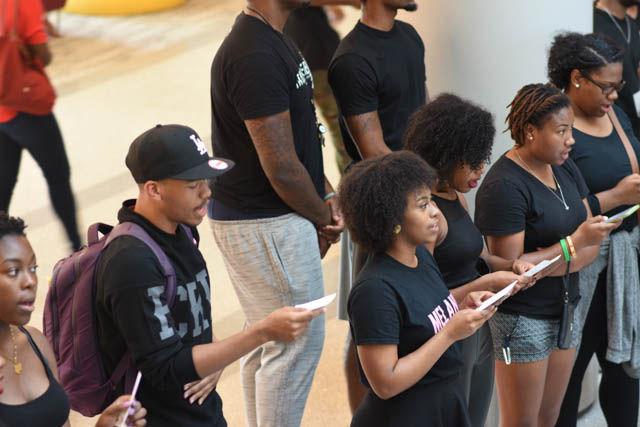 Students sing "Lift Every Voice and Sing" also refered to as the &#160;"Black American National Anthem" before the die-in portion of the event. Participants covered the floor of the atrium in Talley Student Union on Sept. 23 in silence to represent all the lives lost to police brutality.