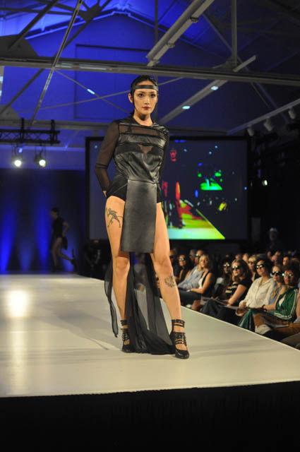 A model showcases Keely Lauren Cansler's pieces at fashionSPARK on Sept. 16 at CAM. For this collection, Cansler looks into addiction and the forbidden fruit that may at times be denied and overlooked.