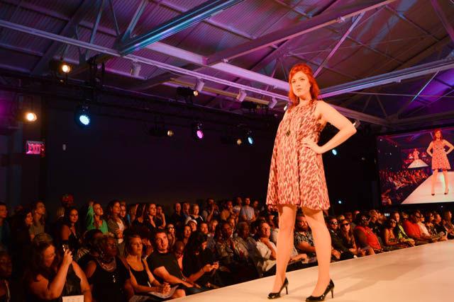 A model showcases one of the outfits in the "Broadway Squared" collection by designer MaryAshlyn Thomas. The collection was inspired by Thomas' daily commute and featured pieces that can be easily transitioned from day to night. MaryAshlyn was one of the eight designers featured at the Wear What You Are fashion show held on Sept. 16 at CAM Raleigh as part of SPARKcon.