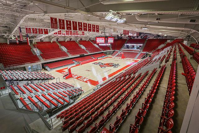 After renovation, the new court on Reynolds Coliseum features a large Mr. Wuf at center court and a brand new score board along with new court-side seats. Reynolds, which will now hold just over 5000 fans for games, or around 6000 for concerts. The court remained empty on Wednesday, Sept. 7, but will be open to the public for its first collegiate sporting event on Friday at 11am for volleyball.