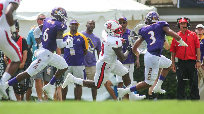 Sophomore running back Reggie Gallaspy II takes an outside run for big yardage against the ECU defense. Gallaspy had a productive day with 61 yards on the ground and seven through the air. The Wolfpack lost a heartbreaking 33-30 game in Dowdy-Ficklen Stadium on Sept. 10th, 2016 after putting up nearly 500 yards.