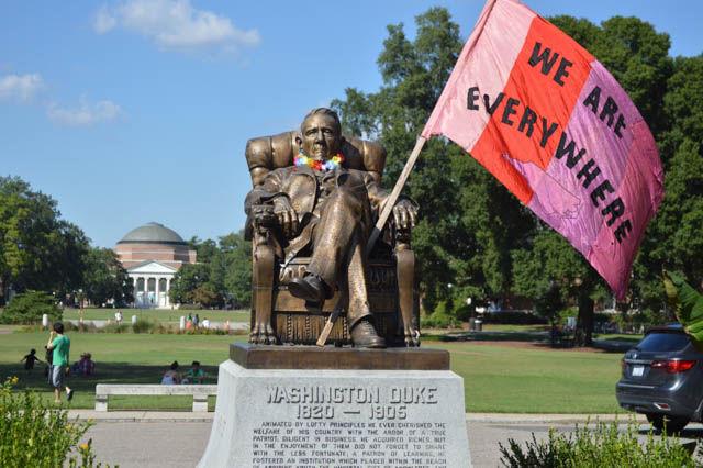 A statue of Washington Duke, who supported Duke University financially for many years before his death in 1905, is decorated with a rainbow lei and a flag stating "WE ARE EVERYWHERE." The statue was decorated during the 32nd North Carolina Pride on Saturday. Pride is a festival that celebrates and promotes unity and visibility among the LGBT community and allies.&#160;