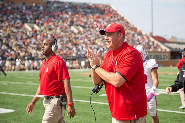 


Head coach Dave Doeren cheers after a Wolfpack touchdown in a convincing win against Wake Forest. The Wolfpack came o of the bye week with a 35-17 victory on Oct. 24 in BB&amp;T Field at Wake Forest.&#160;


