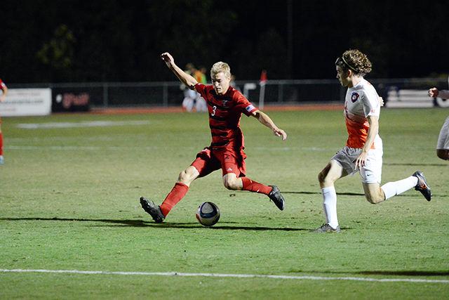 Sophomore defender Caleb Duvernay passes the ball in the 4-1 loss to Clemson on NC Soccer's senior night, Oct. 30 at Dail Soccer Stadium.