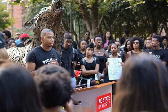 Student Body Vice President Brayndon Stafford, a senior studying environmental science, speaks to students attending the NC State Blackout on Sept. 23. Stafford stressed voting in upcoming elections, reminding students that their vote is their voice in government. The event began with several speakers in Wolf Plaza, and ended with a die-in on the floor of the atrium in Talley Student Union.