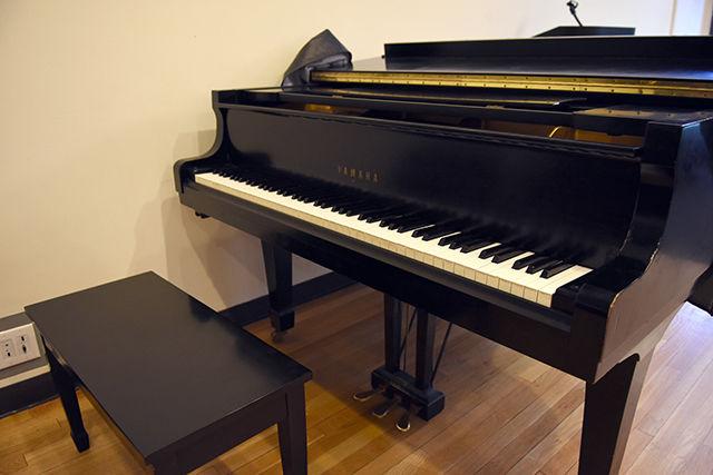 The piano found in the lounge of Caldwell Hall is available for students to play throughout the day.