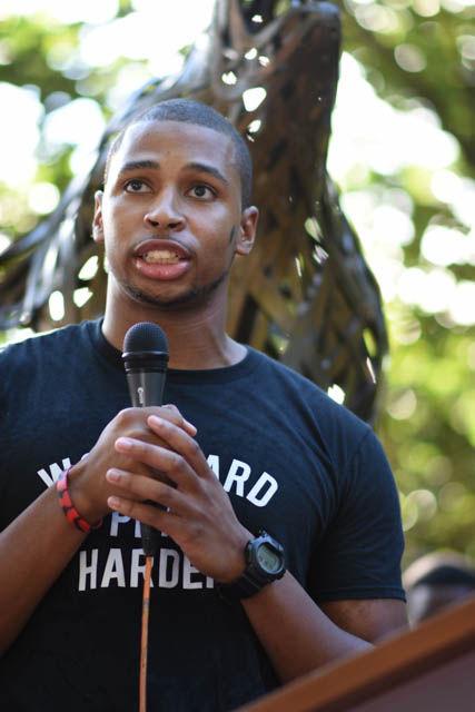 Brayndon Stafford, student body vice president and senior studying environmental sciences, speaks during the NC State Blackout event. Students gathered in Wolf Plaza on Sept. 23 to listen to speakers and bring awareness to the recent events that took place in both Charlotte and Tulsa. "Not just the minority voting power, the millennial voting power. We are the new majority," said Stafford.