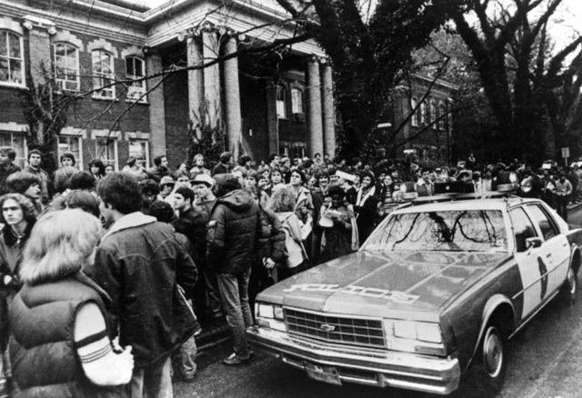 Circa 1980: A police car blocks off Winston Hall during a protest by Iranian students against their home country&#8217;s government.&#160;