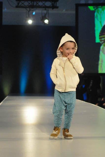 Offsquare Mini launches its first capsule collection with "Up Up and Away," which presents items for children. The models for the designs walked down the runway and modeled the playful clothing at CAM Raleigh for fashionSPARK's Wear What You Are show on Sept. 16.