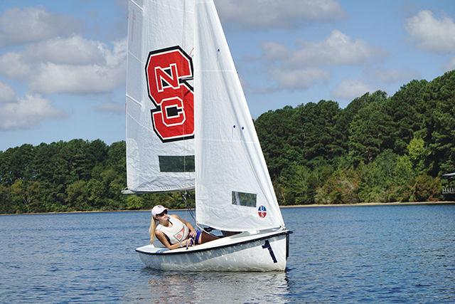 Elizabeth Blenk, a freshman studying engineering, sets a course during the sailing club's first women's regatta. The regatta took place on Sept. 19, 2015 on Lake Wheeler.
&#160;
