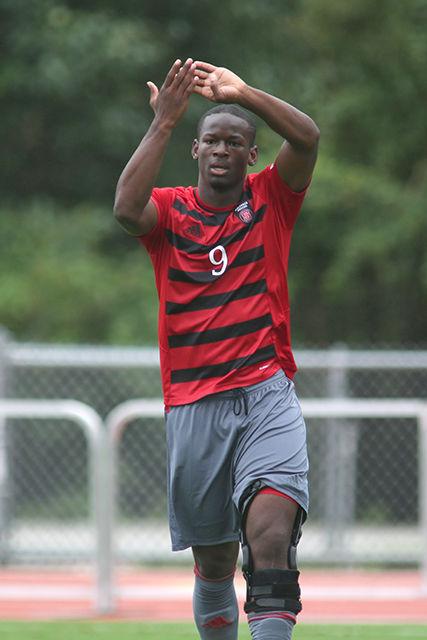 Sophomore forward Ade Taiwo celebrates after taking a shot at the Notre Dame goal. Taiwo led the team with five shots, one of which was on goal. The No. 21 Wolfpack tied No. 7 Notre Dame 1-1 in Dail Soccer Stadium on Oct. 4.