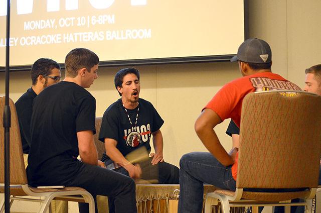 Miskwa Waya, a native drum group, perform at the beginning of the Indigenous Peoples' Day event in Talley on Monday. The drums set the mood for the night by giving an authentic Native American feel. The performance united the crowd with their steady beat.