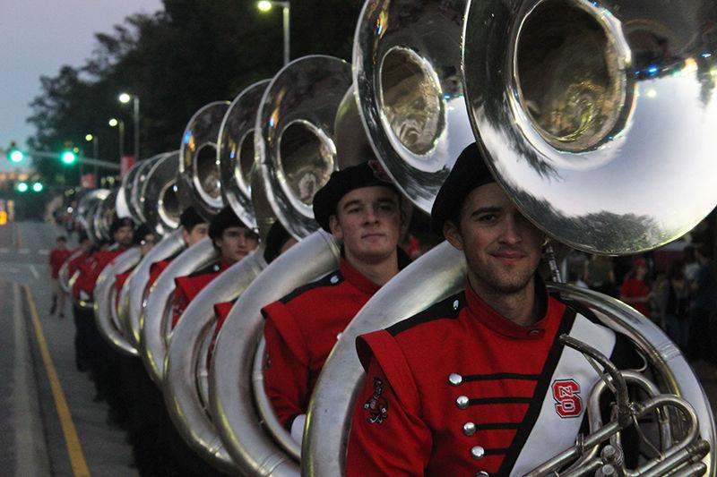 Members of the sousaphone section of the Power Sound of the South march in the homecoming parade Friday. The parade also featured floats from student organizations and ran down Hillsborough Street.