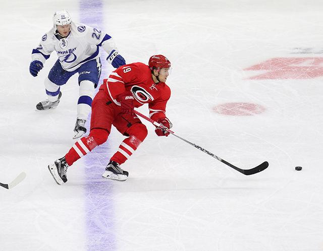 Center Victor Rask splits Lightning defenders on a fast break. The Carolina Hurricanes fell short of grabbing their fourth straight win, losing 4-3 to the Lightning at PNC Arena on Nov. 1, 2015.&#160;Rask finished the game with 3 assists and 4 out of 10 faceoffs won.&#160;