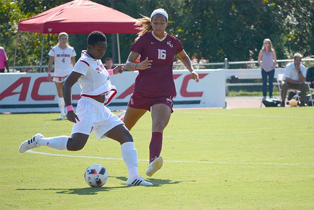 Sophmore defender Ella Bonner kicks the ball down the field and past a defender during the game against Florida State University on Saturday in Dail Soccer Stadium. Ella played the entire 90 minutes of the game.