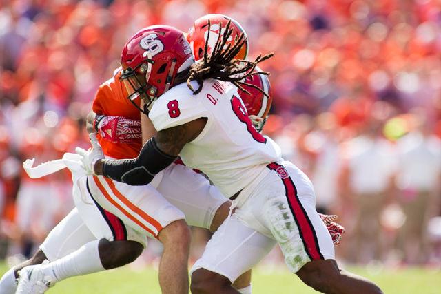 Senior nickelback Dravious Wright helps make a stop. The Wolfpack suffered a heartbreaking 24-17 overtime defeat at Death Valley in Clemson, SC Saturday.