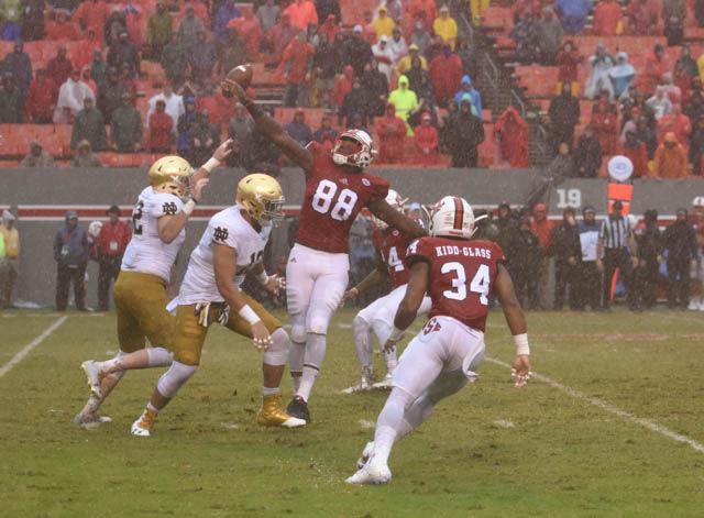 Redshirt junior tight end Pharoah McKever blocks a Notre Dame punt on Oct. 8 at Carter-Finley Stadium. The block led to the game's only touchdown scored by Dexter Wright, a redshirt sophomore safety. The Wolfpack defeated the Fighting Irish 10-3 on Carter-Finley's 50th anniversary.
