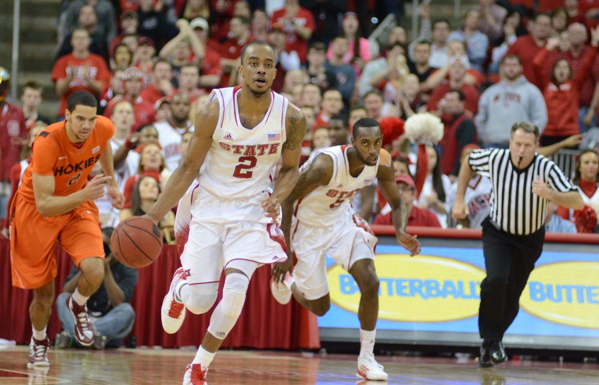 Junior guard Lorenzo Brown dribbles down the court on a break away against Virginia Tech Saturday, February 16, 2013. Brown had 15 points and 7 assists in the Wolfpack's 90-86 win in overtime at PNC Arena. Photo by Ryan Parry.