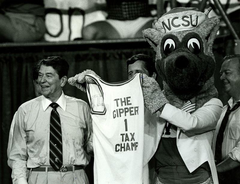 Sept. 5, 1985: President Ronald Reagan poses with Mr. Wuf after speaking in Reynolds Coliseum about tax reform.