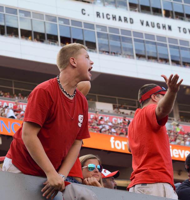 Benjamin Melton, a Wolfpack fan, yells out support to NC State at the Carter-Finley Stadium in the game agaist Wake Forest with a 33-16 win on Oct. 1.