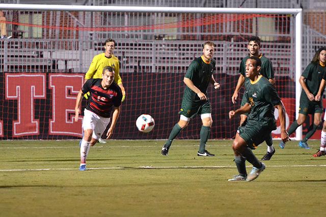 Julius Duchscherer, a sophomore midfielder, steals the ball away from the Wright State Raiders during the men's soccer game on Sept. 27 in Dail Soccer Stadium. The Wolfpack won against the Raiders 4-2, making this their third win this season.