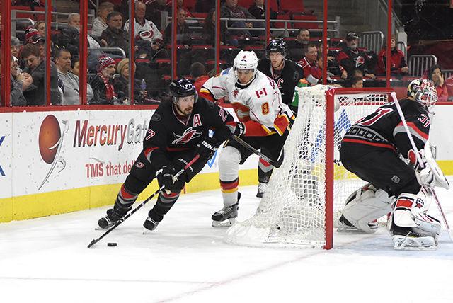 Carolina Hurricanes defenseman Justin Faulk clears the puck. The Hurricanes defeated the Calgary Flames 5-2 at the PNC Arena on Jan. 24.&#160;