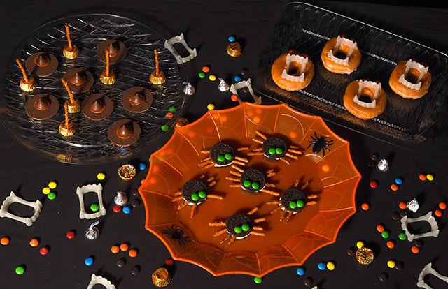 These Halloween treats are made with various candies and cookies.&#160;