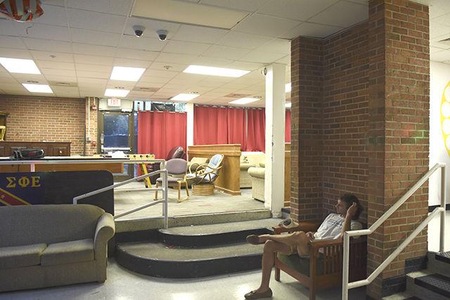 Ben Craver, a junior studying industrial systems engineering and the co-housing manager of Sigma Phi Epsilon fraternity, sits in a chair in the living room of the fraternity's house on Greek Court on Aug. 27. Craver and his fraternity brothers have expressed concern about the security cameras that the university installed in the Greek houses claiming that they were placed in locations that are too close to private living spaces.&#160;