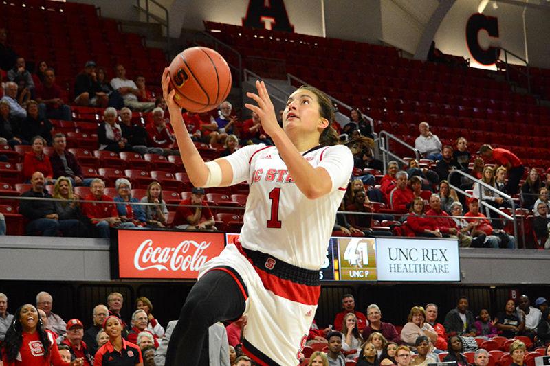 Freshman guard Aislinn Konig goes up for a layup during the Wolfpack&#8217;s exhibition game against UNC-Pembroke on Friday in Reynolds Coliseum. Konig recorded seven total points in 18 minutes of play during the Pack&#8217;s 96-41 win over the Braves.&#160;