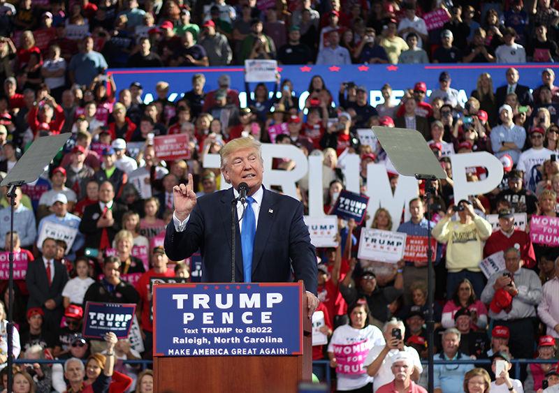 Republican presidential candidate Donald Trump holds a rally in Dorton Arena on Monday. Gov. Pat McCrory and former Arkansas Gov. Mike Huckabee were among the speakers at the event. Trump urged people to go out and vote saying, "One more day!" repeatedly to the crowd.