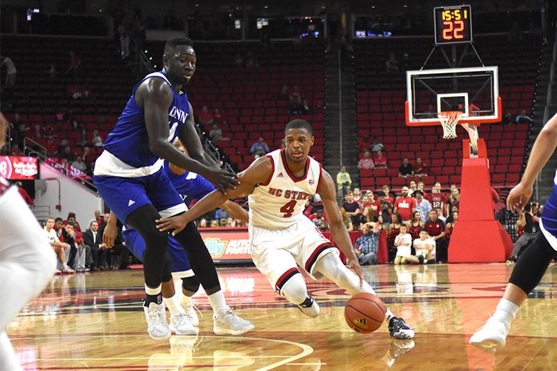 Dennis Smith Jr. helps the Wolfpack clench victory on Thursday in PNC Arena against Lynn University. Smith lead the team with 22 total points. The final score was 100-66 Wolfpack.