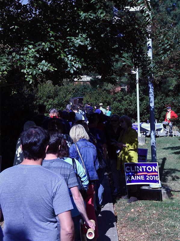Voters wait in line to vote early at the Creative Services Building on Friday. The Board of Elections chose the Creative Services Building as an on-campus earl voting location earlier this year. It can be found at 1220 Varsity Drive.