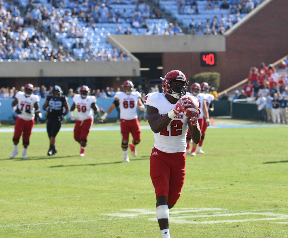 Sophomore wide receiver Stephen Louis makes a huge catch for the Wolfpack as they face UNC-Chapel Hill on Friday in Kenan Stadium. The Wolfpack were victorious over the Tar Heels by a score of 28-21.