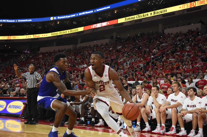 Redshirt senior guard Torin Dorn plays hard against Lynn University in PNC Arena on Thursday. Dorn had eight rebounds. The final score was 100-66, Wolfpack.