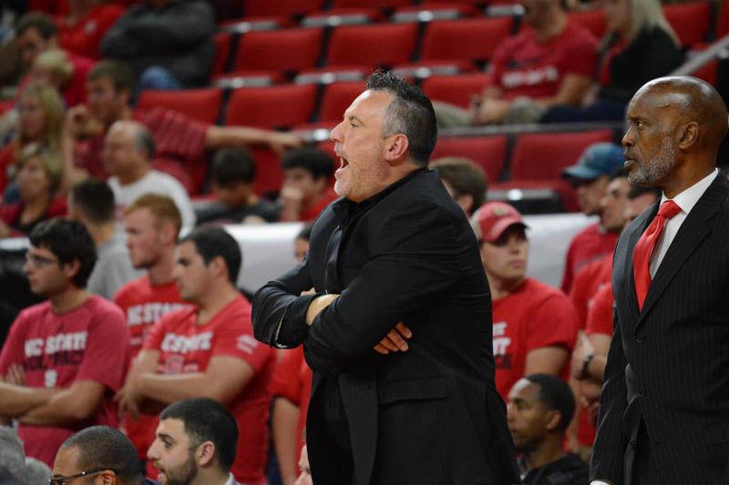 Assistand Head Coach Heath Schroyer yells instructions to the NCSU men's basketball team while Assistant Head Coach Butch Pierre keeps an eye on the action during the NC State-St. Francis Brooklyn College game on Nov. 13, 2016 in PNC Arena, which NCSU won 86-61. Schroyer and Pierre both recently joined the men's basketball coaching staff earlier this year.