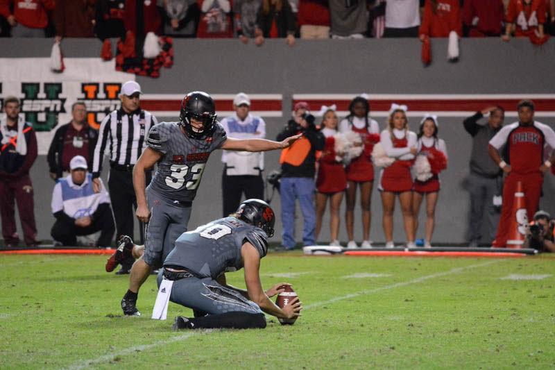 Connor Haskins, a graduate place kicker, runs into his field goal kick during the game against the Seminoles at Carter-Finley Stadium. Haskins was two for two on his field goal kicks during the game on Saturday. The Wolfpack lost the game by a score of 20-24 against the Florida State Seminoles.