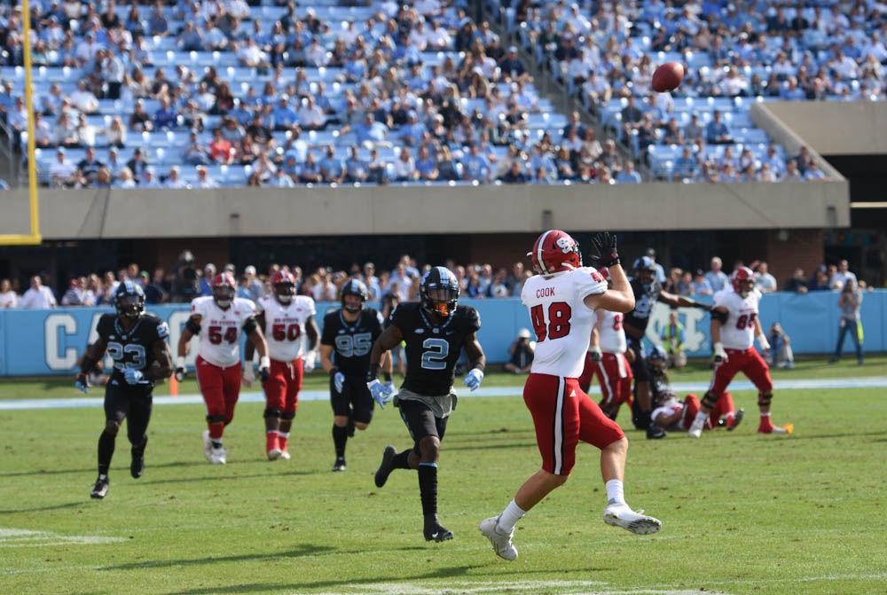 Junior tightend Cole Cook catches a pass in Kenan Memorial Stadium on Friday against UNC-Chapel Hill. NC State had 223 passing yards during the game. The Pack defeated the Tar heels, 28-21.