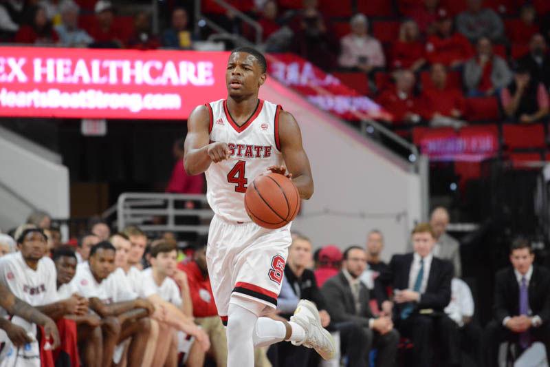 Freshman guard Dennis Smith Jr. dribbles downcourt during the men's basketball game against St. Francis Brooklyn College on Nov. 13, 2016. Smith Jr. added 12 points to the Wolfpack's 86-61 win over the Terriers.
